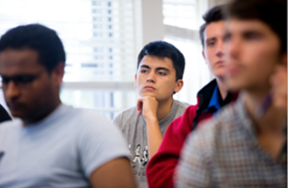 A Bowdoin student in class